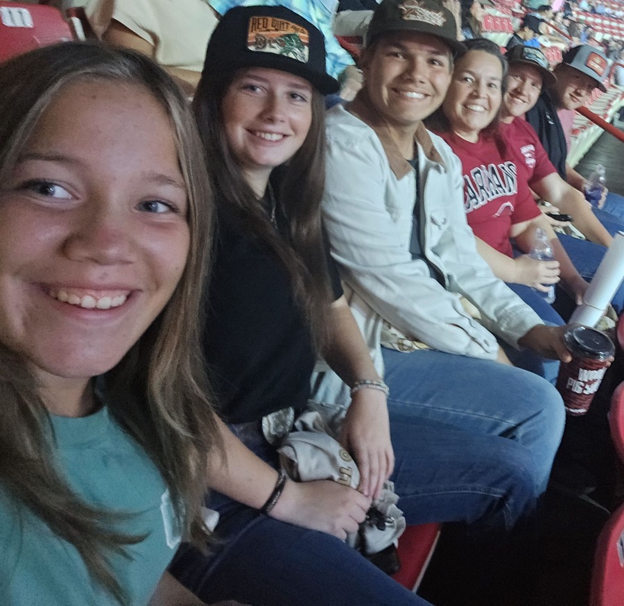Colby and family together at a Razorbacks game.
