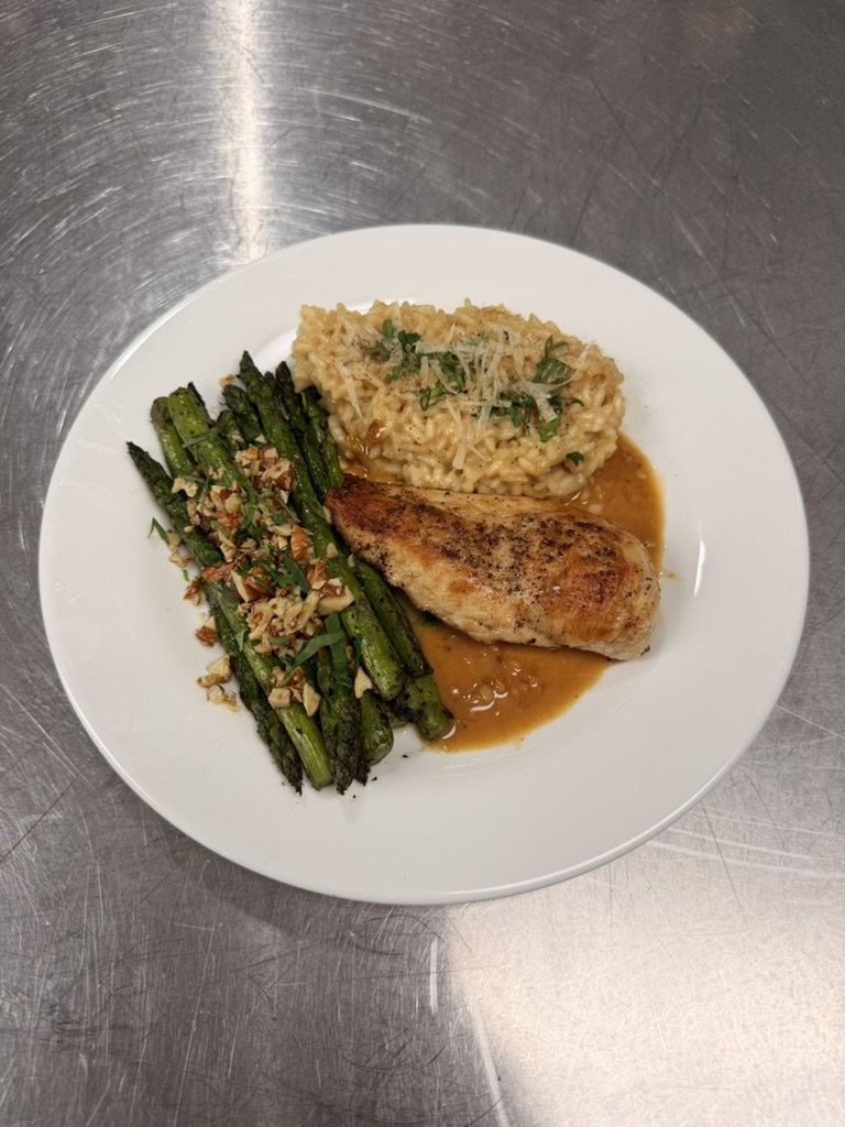 Sautéed chicken with Parmesan risotto and blistered asparagus